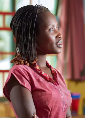 A teacher standing at the front of a classroom